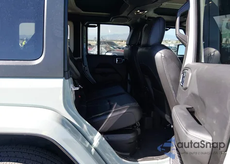 2023 Jeep Wrangler 4Xe Sahara 4X4 z USA, uszkodzony, nr VIN 1C4JJXP65PW683521